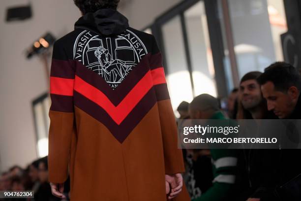 Model presents a creation for fashion house MSGM during the Men's and Women's Fall/Winter 2019 fashion show in Milan, on January 14, 2018. / AFP...