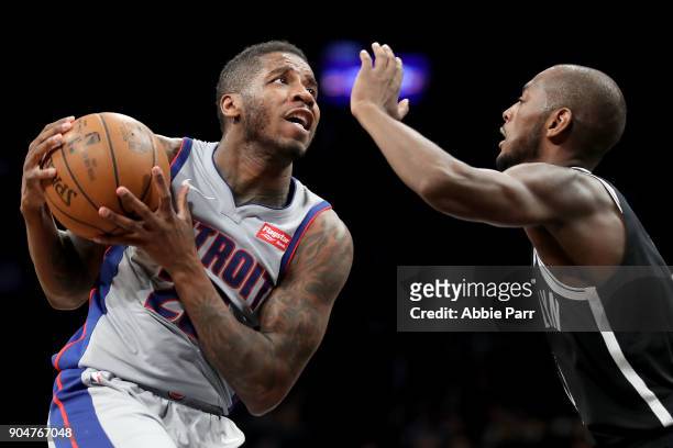 Dwight Buycks of the Detroit Pistons works against Milton Doyle of the Brooklyn Nets in the fourth quarter during their game at Barclays Center on...