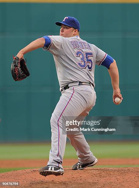 Tommy Hunter of the Texas Rangers pitches against the Cleveland Indians during the game at Progressive Field on September 8, 2009 in Cleveland, Ohio....