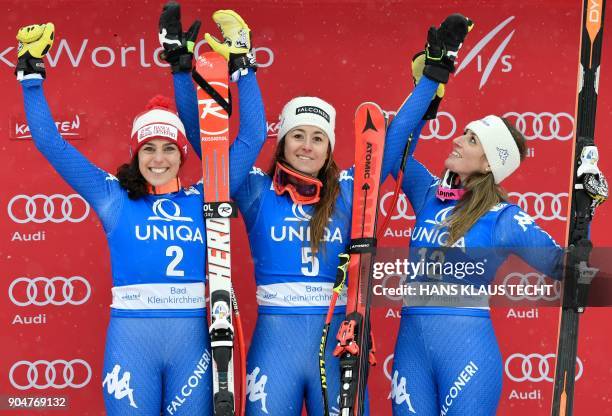 Second placed Federica Brignone of Italy, winner Sofia Goggia of Italy and third placed Nadia Fanchini of Italy celebrate on the podium of the FIS...