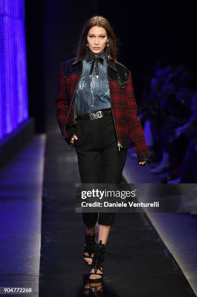 Bella Hadid walks the runway at the Dsquared2 show during Milan Men's Fashion Week Fall/Winter 2018/19 on January 14, 2018 in Milan, Italy.
