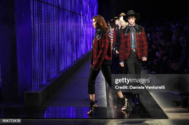 Bella Hadid walks the runway at the Dsquared2 show during Milan Men's Fashion Week Fall/Winter 2018/19 on January 14, 2018 in Milan, Italy.