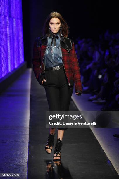 Bella Hadid walks the runway at the Dsquared2 show during Milan Men's Fashion Week Fall/Winter 2018/19 on January 14, 2018 in Milan, Italy.