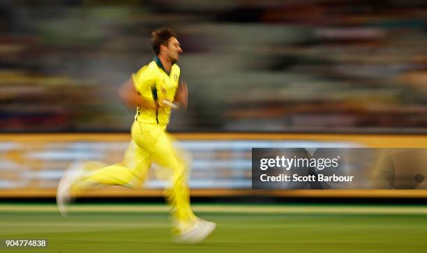 Pat Cummins of Australia bowls during game one of the One Day International Series between Australia and England at Melbourne Cricket Ground on...
