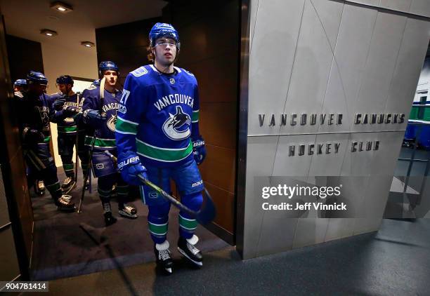 Ben Hutton of the Vancouver Canucks leaves the Canucks dressing room during their NHL game against the Nashville Predators at Rogers Arena December...