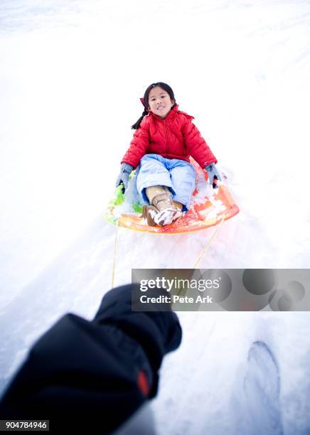 snow sledding - big bear lake stock pictures, royalty-free photos & images