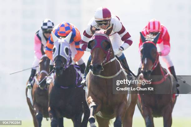 Jockey Douglas Whyte riding Hair Trigger wins Race 3 Oak Steamship Handicap at Sha Tin racecourse on January 13, 2018 in Hong Kong, Hong Kong.