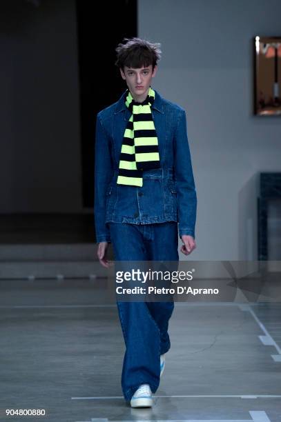 Model walks the runway at the Sunnei show during Milan Men's Fashion Week Fall/Winter 2018/19 on January 14, 2018 in Milan, Italy.