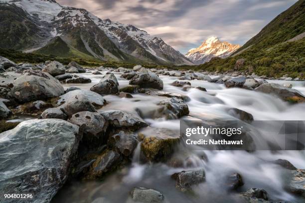 hooker river with long exposure aoraki mt cook national park, new zealand - mt cook stock pictures, royalty-free photos & images