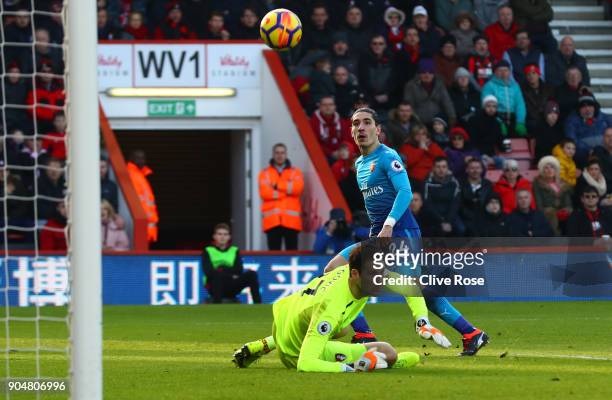 Hector Bellerin of Arsenal scores his sides first goal past Asmir Begovic of AFC Bournemouth during the Premier League match between AFC Bournemouth...