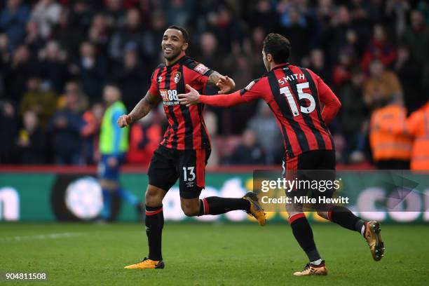 Callum Wilson of AFC Bournemouth celebrates with team mate Adam Smith after scoring the first AFC Bournemouth goal during the Premier League match...