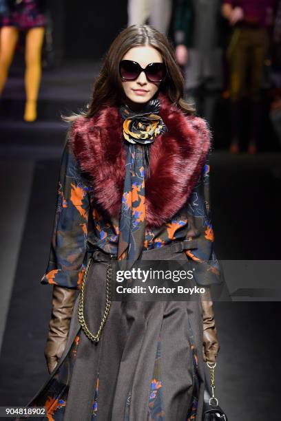 Model walks the runway at the Daks show during Milan Men's Fashion Week Fall/Winter 2018/19 on January 14, 2018 in Milan, Italy.