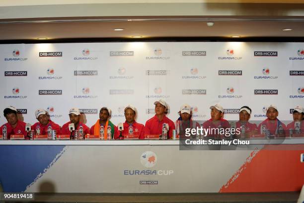 Arjun Atwal captain of team Asia speaks while his players looks on during the post match press conference after the presentation ceremony following...