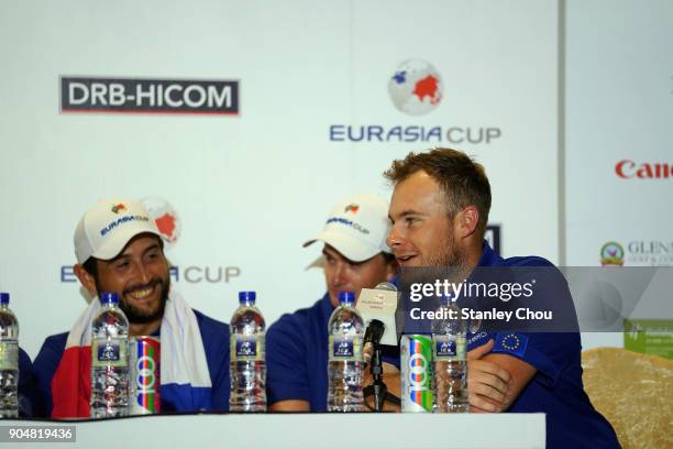 Tyrrell Hatton of team Europe speaks while Alex Levy looks on during the post match press conference after the presentation ceremony following their...