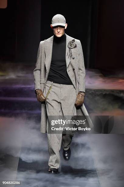 Model walks the runway at the Daks show during Milan Men's Fashion Week Fall/Winter 2018/19 on January 14, 2018 in Milan, Italy.