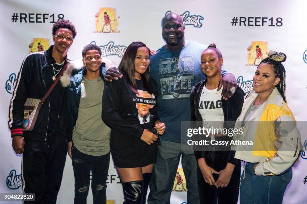 Shareef O'Neal poses with Shaquille O'Neal and Shaunie O'Neal as he celebrates 18th birthday party at West Coast Customs on January 13, 2018 in...