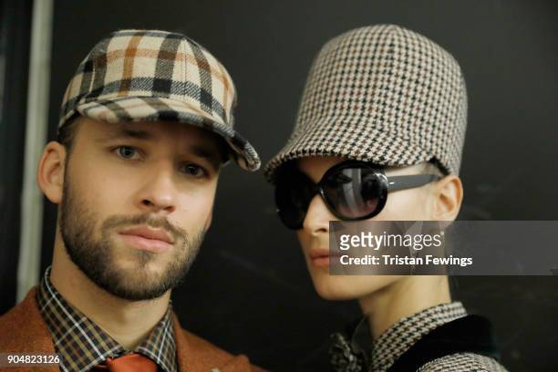 Models are seen backstage ahead of the Daks show during Milan Men's Fashion Week Fall/Winter 2018/19 on January 14, 2018 in Milan, Italy.