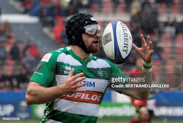 Treviso's fly-half Ian McKinley grabs the ball during the Champions Cup rugby union match RC Toulon vs Treviso on January 14, 2018 at the Mayol...