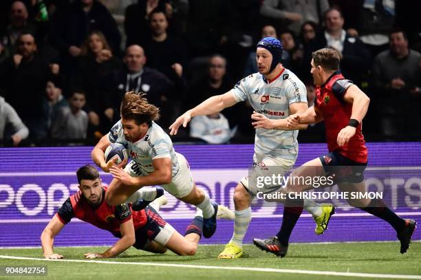 Racing's French hooker Dimitri Szarzewski scores a try during the European Champions Cup rugby union match between Racing 92 and Munster on January...