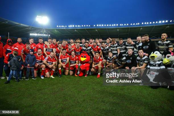 Hull FC and Hull KR pose for a photo during the Clive Sullivan Trophy, pre-season friendly match between Hull FC and Hull KR at KCOM Stadium on...