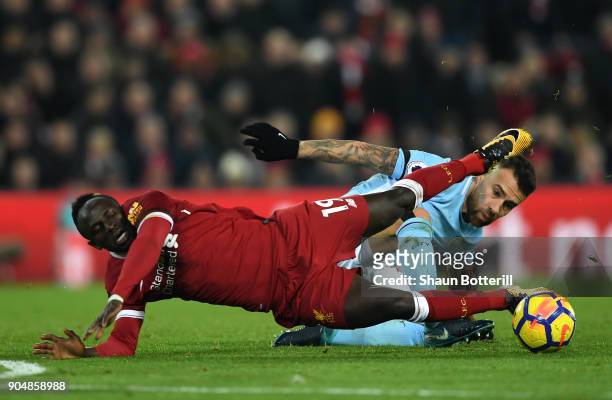 Sadio Mane of Liverpool and Nicolas Otamendi of Manchester City in action during the Premier League match between Liverpool and Manchester City at...