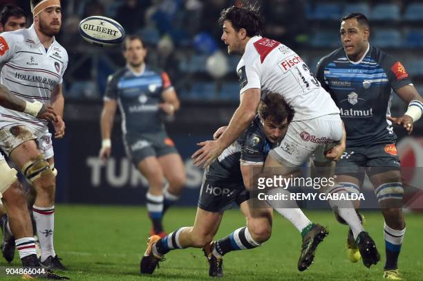 Leicester's centre Matt Smith passes the ball during the European Champions Cup rugby union match between Castres Olympique and Leicester Tigers, at...