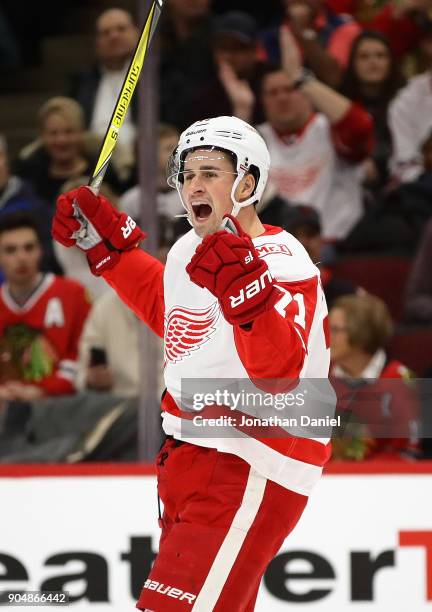 Dylan Larkin of the Detroit Red Wings celebrates after scoring a first period goal against the Chicago Blackhawks at the United Center on January 14,...
