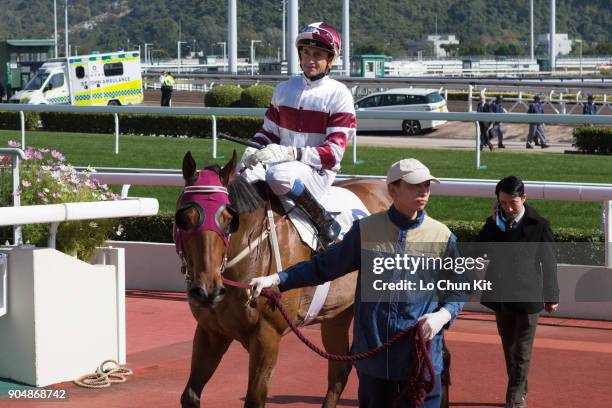 Jockey Douglas Whyte riding Hair Trigger wins Race 3 Oak Steamship Handicap at Sha Tin racecourse on January 13, 2018 in Hong Kong, Hong Kong.