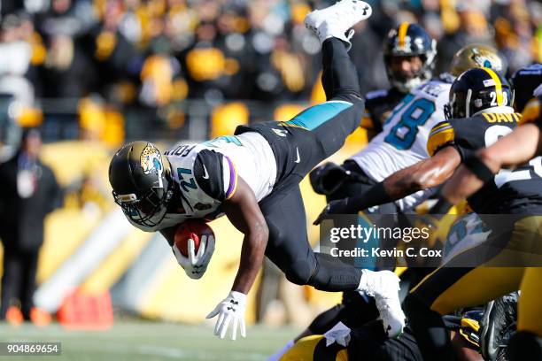 Leonard Fournette of the Jacksonville Jaguars dives into the end zone for a touchdown against the Pittsburgh Steelers during the first half of the...