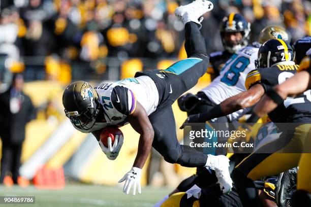 Leonard Fournette of the Jacksonville Jaguars dives into the end zone for a touchdown against the Pittsburgh Steelers during the first half of the...