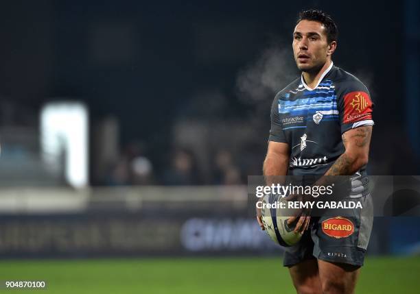 Castres' scrum half Ludovic Radosavljevic holds the ball during the European Champions Cup rugby union match between Castres Olympique and Leicester...