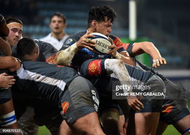 Castres' number eight Alex Tulou clears the ball during the European Champions Cup rugby union match between Castres Olympique and Leicester Tigers,...