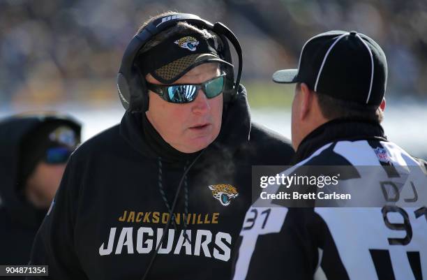 Head coach Doug Marrone of the Jacksonville Jaguars asks head linesman Jerry Bergman for a replay review in the first quarter during the AFC...