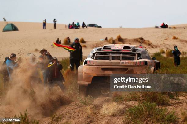 Stephane Peterhansel of France and Peugeot Total drives with co-driver Jean Paul Cottret of France in the 3008 DKR Peugeot car in the Classe : T1.4 2...