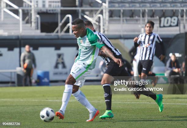 Andres Renteria of Colombian side Atletico Nacional kicks a goal against Brazilian club Atletico Mineiro during the first half of their Florida Cup...
