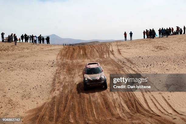 Orlando Terranova of Argentina and Mini X-Raid drives with co-driver Bernardo Graue of Argentina in the Mini John Cooper Rally Works car in the...