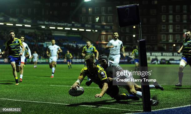 Gareth Anscombe of Cardiff Blues goes over for his sides second try during the European Rugby Challenge Cup match between Cardiff Blues and Toulouse...