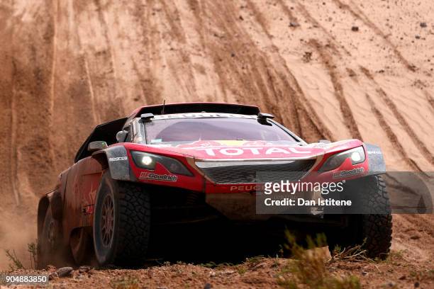 Cyril Despres of France and Peugeot Total drives with co-driver David Castera of France in the 3008 DKR Peugeot car in the Classe : T1.4 2 Roues...