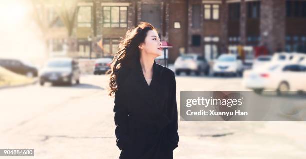 portrait of a beautiful young woman. - curly hair ストックフォトと画像