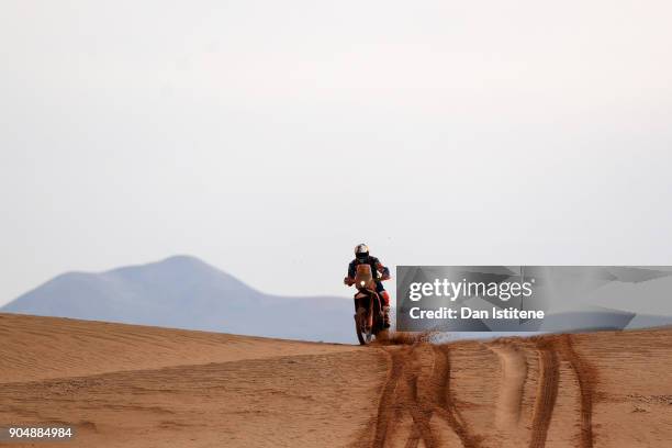 Matthias Walkner of Austria and Red Bull KTM rides a 450 Rally Replica KTM bike in the Elite ASO during stage eight of the 2018 Dakar Rally between...