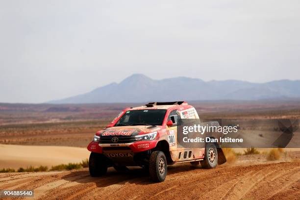 Nasser Al-Attiyah of Qatar and Toyota Gazoo Racing drives with co-driver Matthieu Baumel of France in the Hilux Toyota car in the Classe : T1.1 : 4x4...