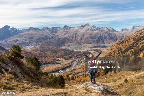 solo traveller hiking in engadin, switzerland - graubunden canton ストックフォトと画像