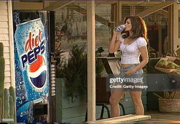 Supermodel Cindy Crawford drinks a Pepsi in this undated company supplied photograph. Crawford will star in a new Diet Pepsi commercial during the...