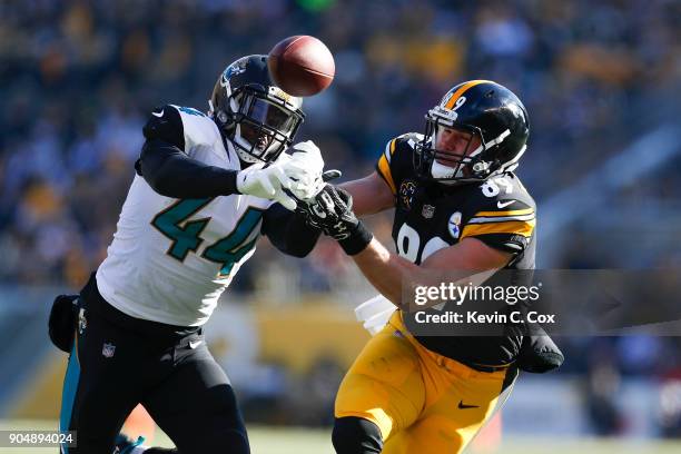 Myles Jack of the Jacksonville Jaguars intercepts a pass intended for Vance McDonald of the Pittsburgh Steelers during the first half of the AFC...
