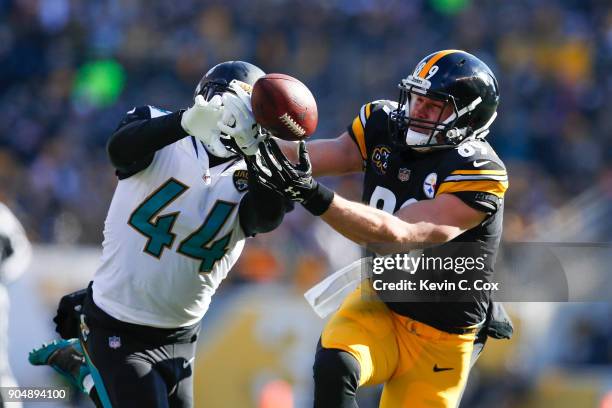 Myles Jack of the Jacksonville Jaguars intercepts a pass intended for Vance McDonald of the Pittsburgh Steelers during the first half of the AFC...