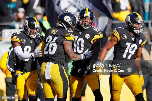 Martavis Bryant of the Pittsburgh Steelers celebrates with teammates after a touchdown reception against the Jacksonville Jaguars during the first...