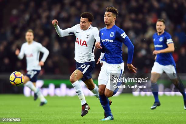 Tottenham Hotspur's Dele Alli hassles Everton's Mason Holgate during the Premier League match between Tottenham Hotspur against Everton at Wembley...
