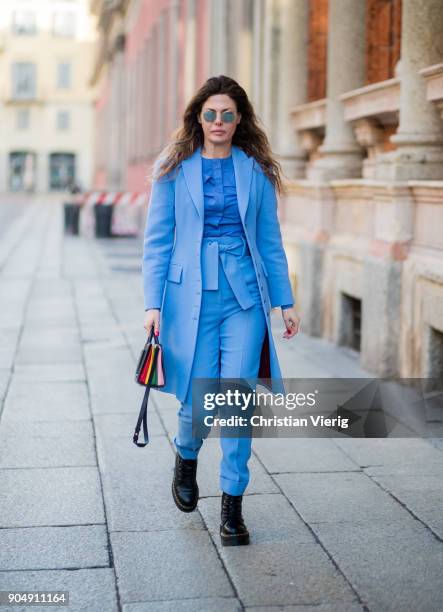 Sara Battaglia wearing blue coat, pants, blouse is seen outside MSGM during Milan Men's Fashion Week Fall/Winter 2018/19 on January 14, 2018 in...