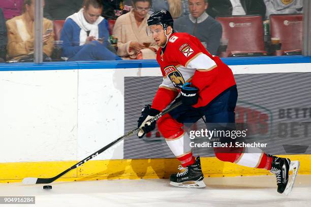 Alex Petrovic of the Florida Panthers skates with the puck against the Calgary Flames at the BB&T Center on January 12, 2018 in Sunrise, Florida.