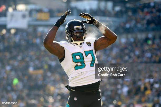 Malik Jackson of the Jacksonville Jaguars celebrates against the Pittsburgh Steelers during the first half of the AFC Divisional Playoff game at...